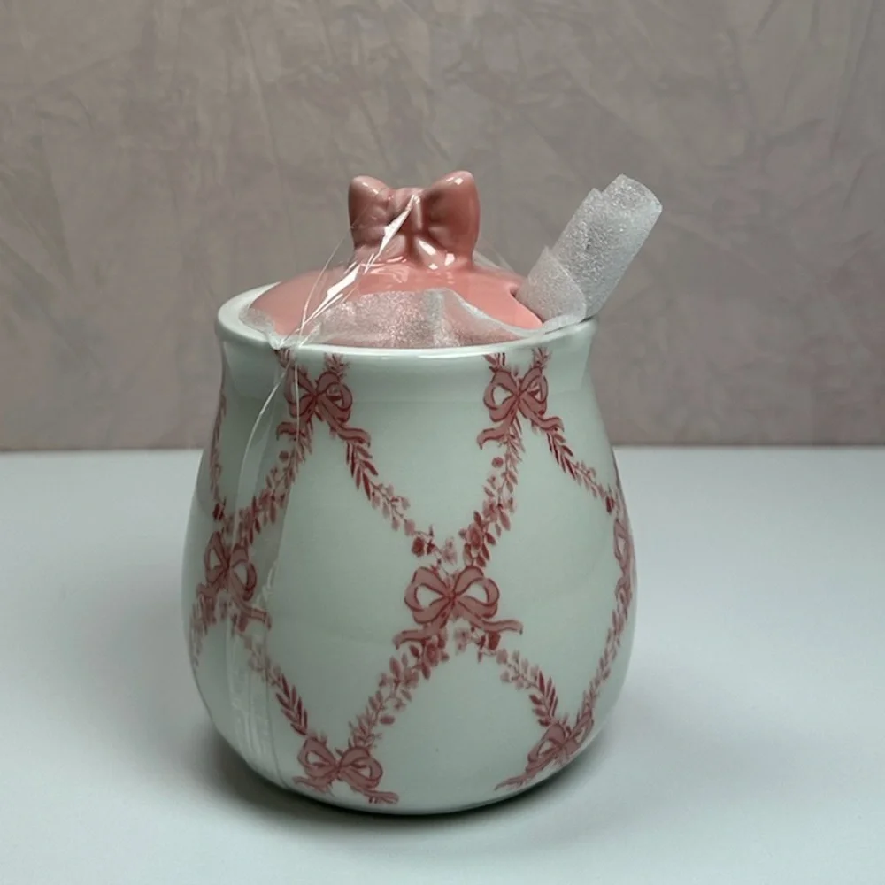 Elegant Pink and White Ceramic Sugar Bowl with Bow Accents